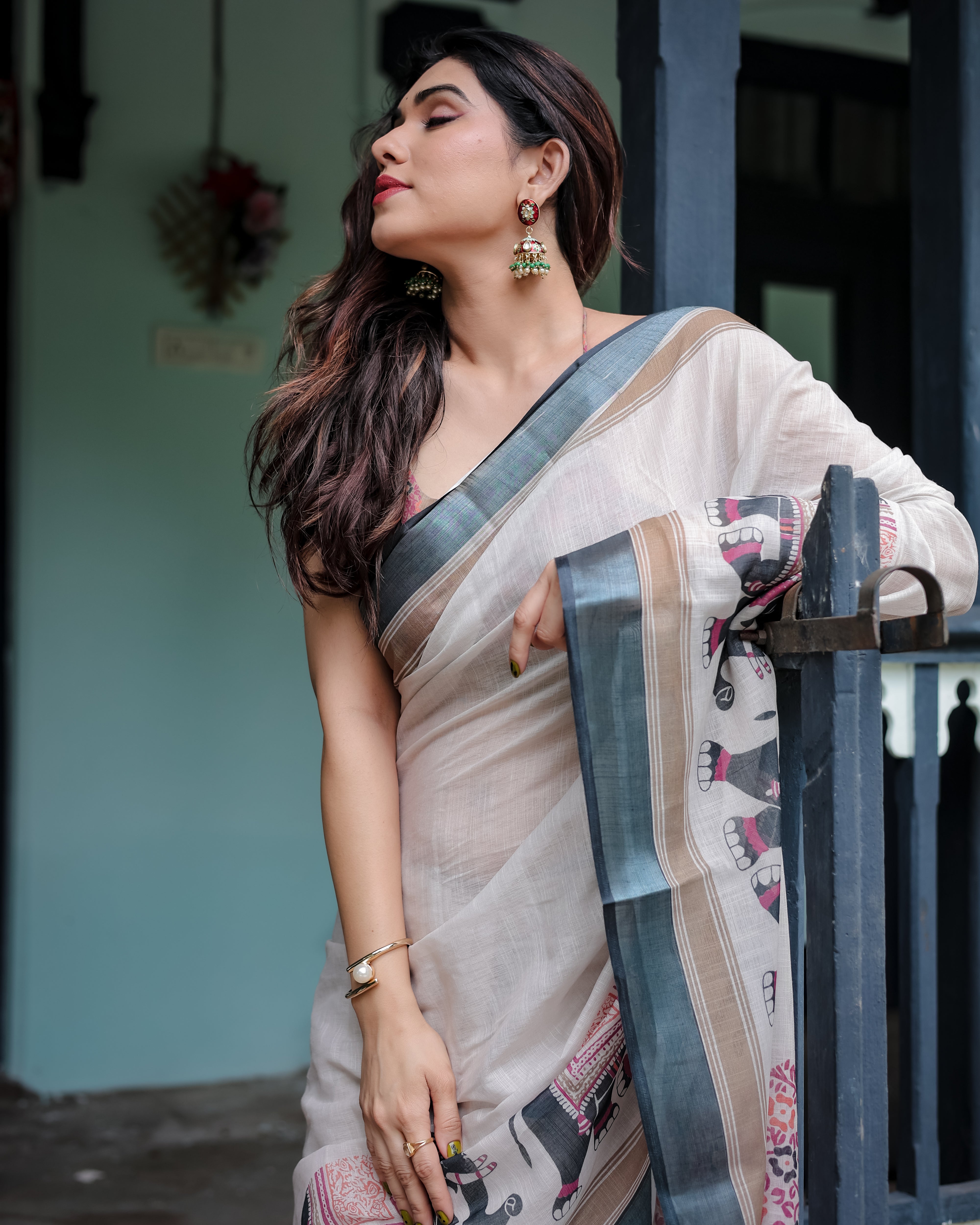 Ivory Pure Cotton Linen Saree with Elephant Print Border