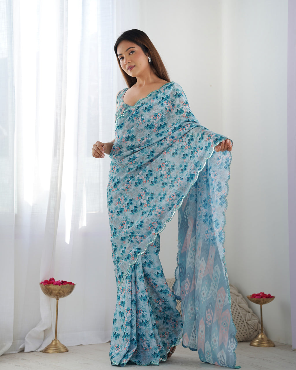 Aqua Blue Heavy Chinnon Printed Saree with Kutchi Mirror Border