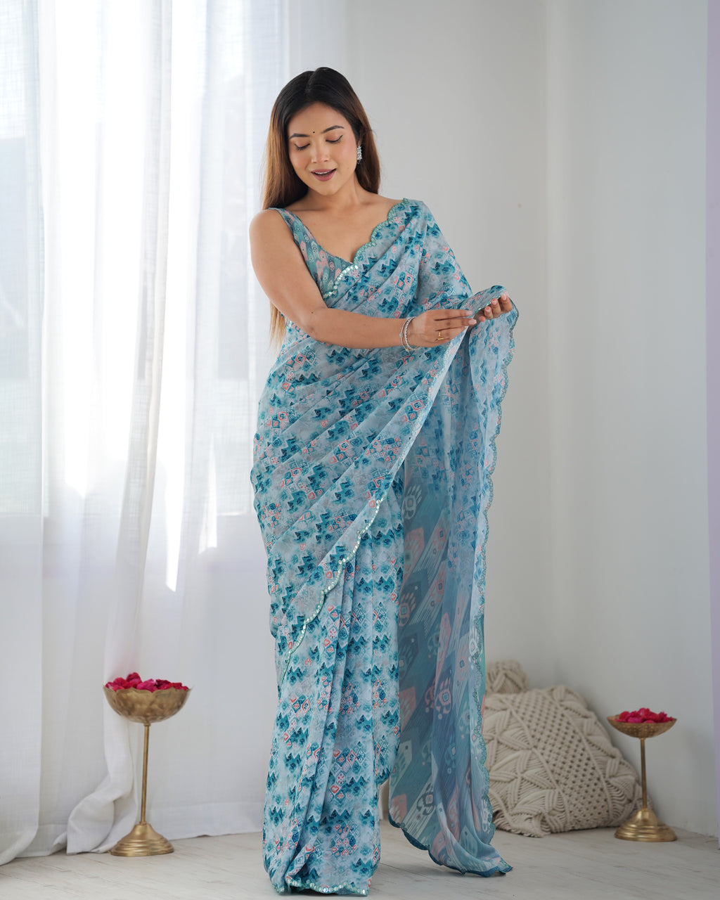 Aqua Blue Heavy Chinnon Printed Saree with Kutchi Mirror Border