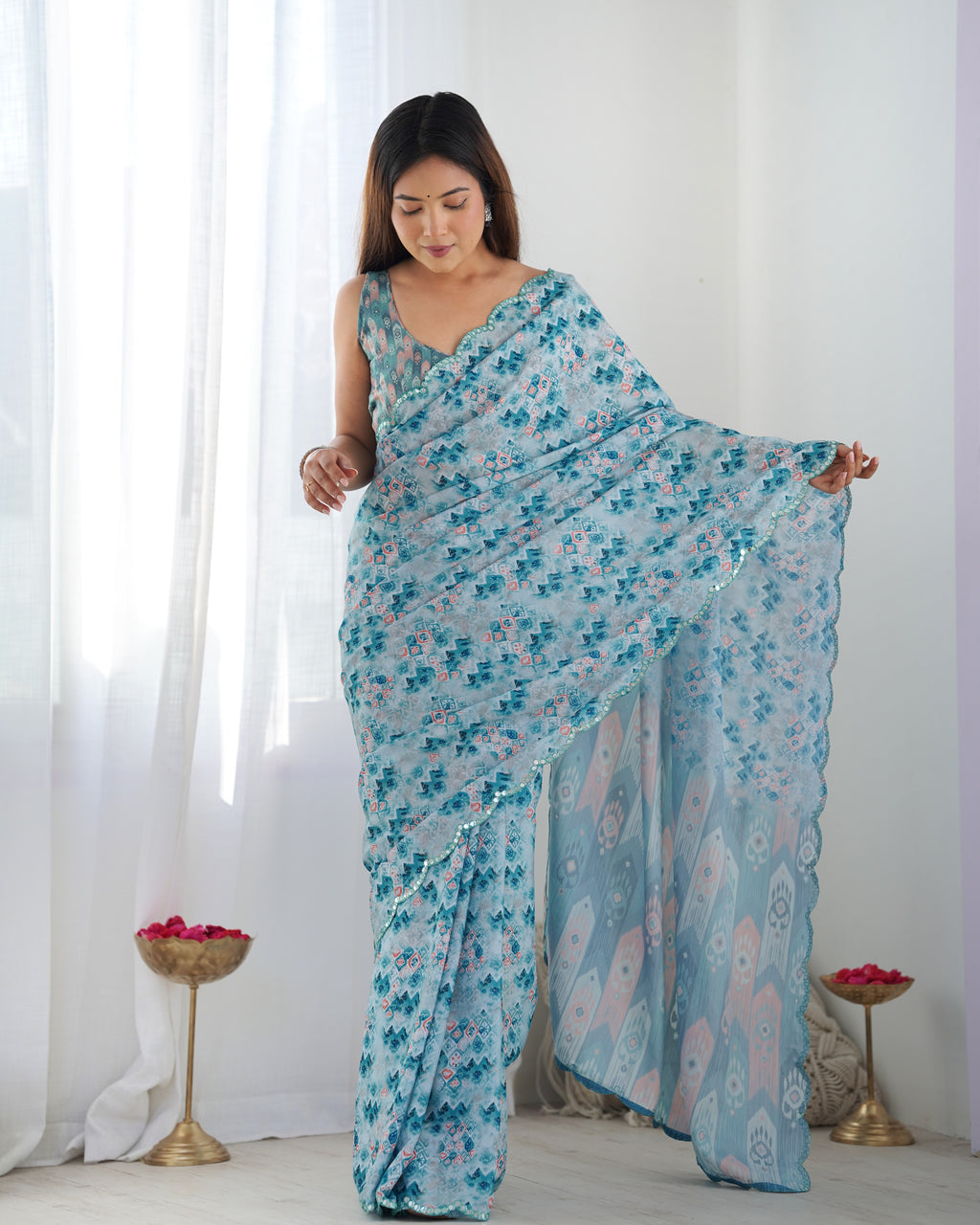 Aqua Blue Heavy Chinnon Printed Saree with Kutchi Mirror Border