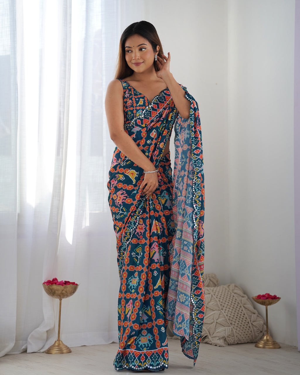 Heavy Chinnon Teal Blue Kutchi Print Saree with Mirror Lace Border