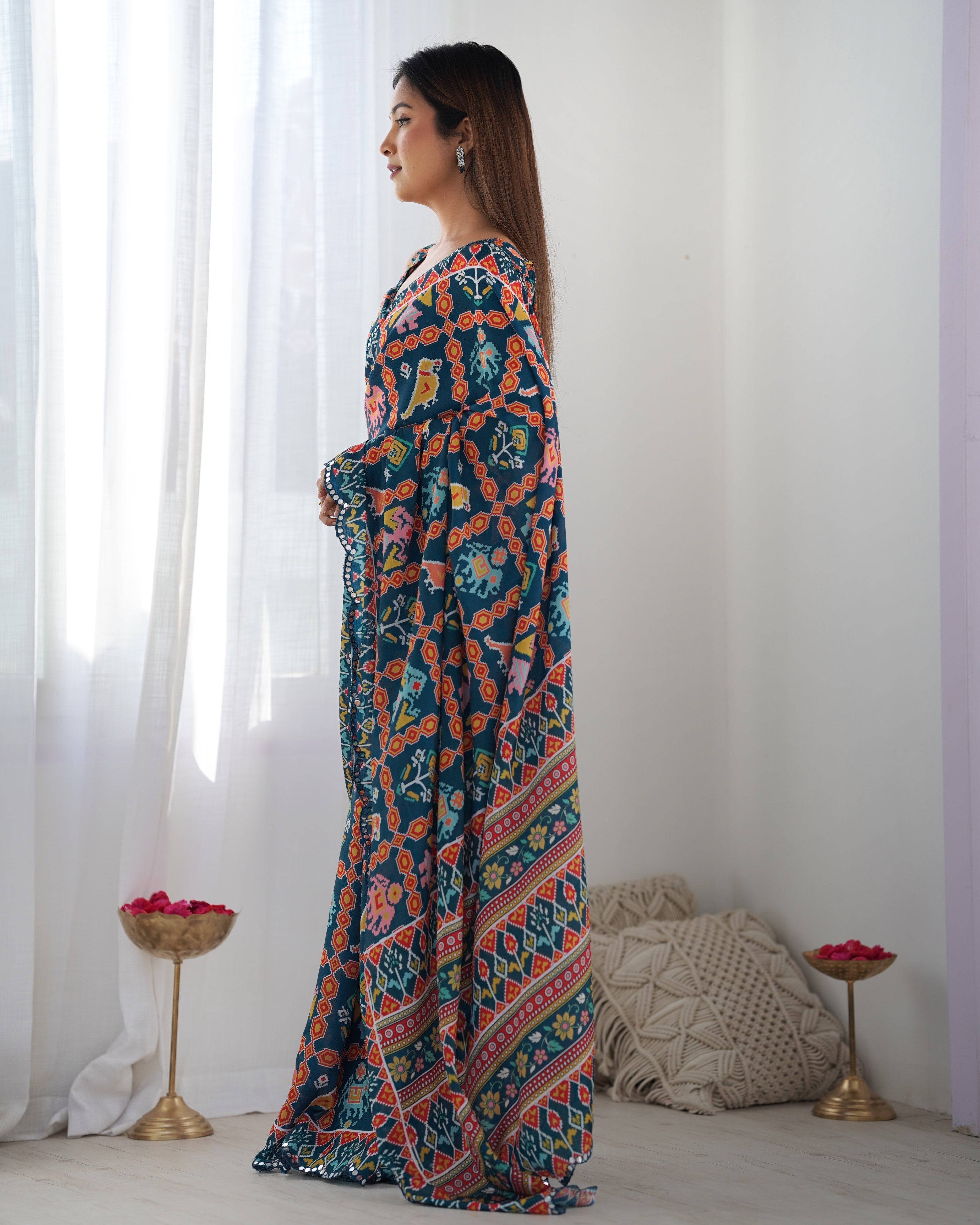 Heavy Chinnon Teal Blue Kutchi Print Saree with Mirror Lace Border