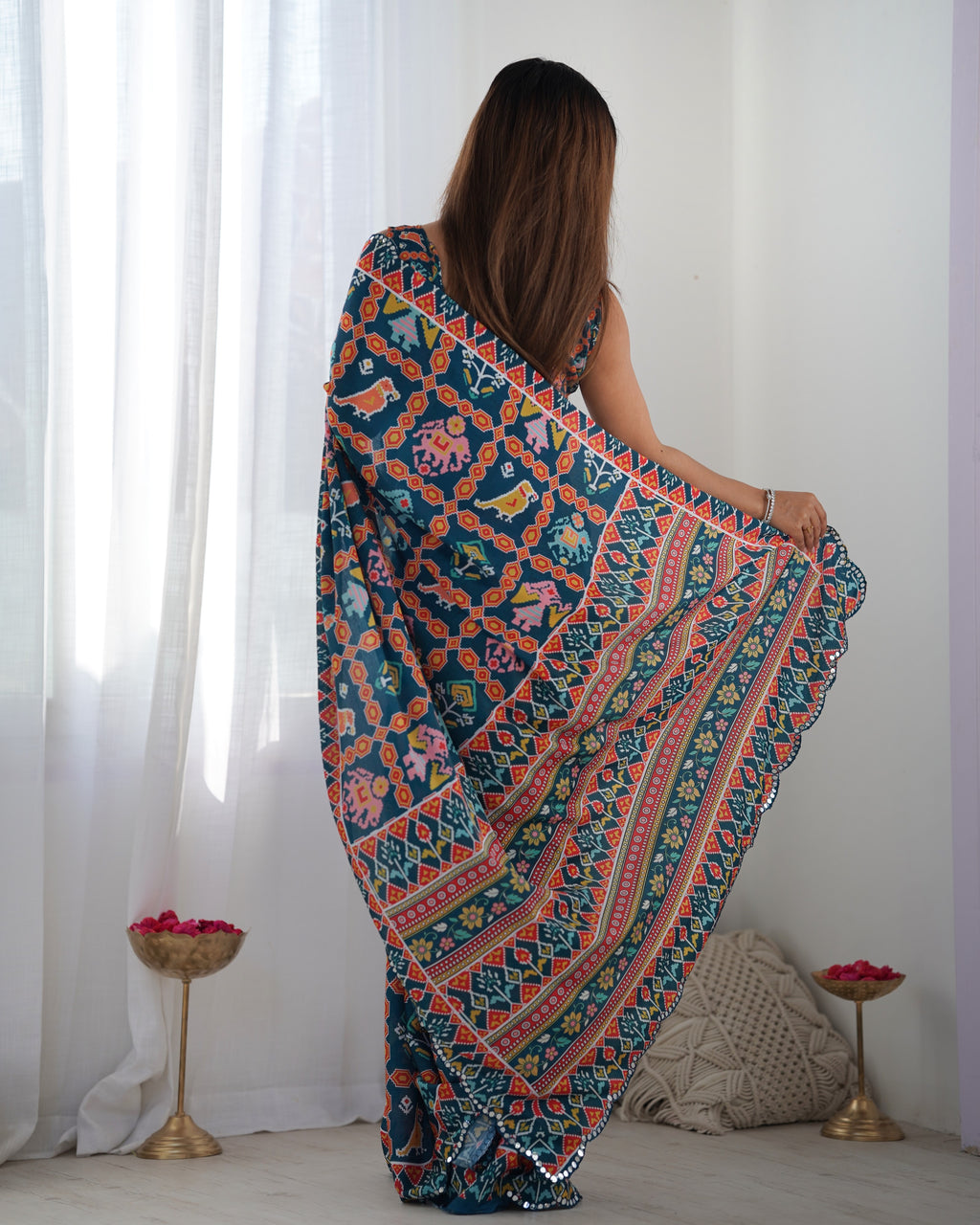 Heavy Chinnon Teal Blue Kutchi Print Saree with Mirror Lace Border