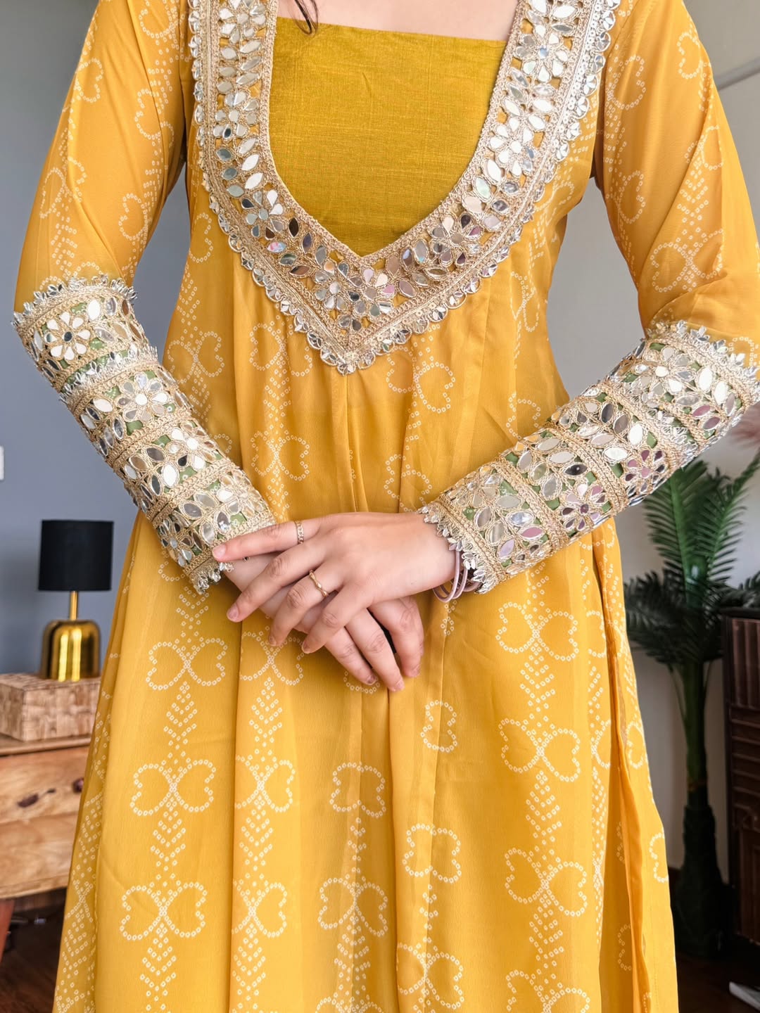 Yellow Anarkali Kurta Set with intricate silver embroidery on a neutral background