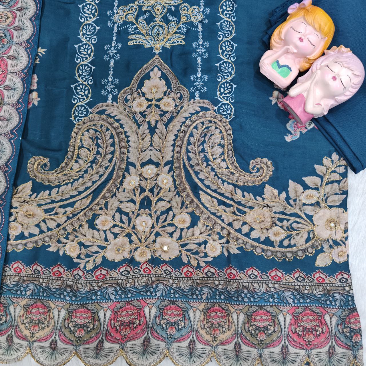 Decorative fabric with intricate patterns and designs on a blue background