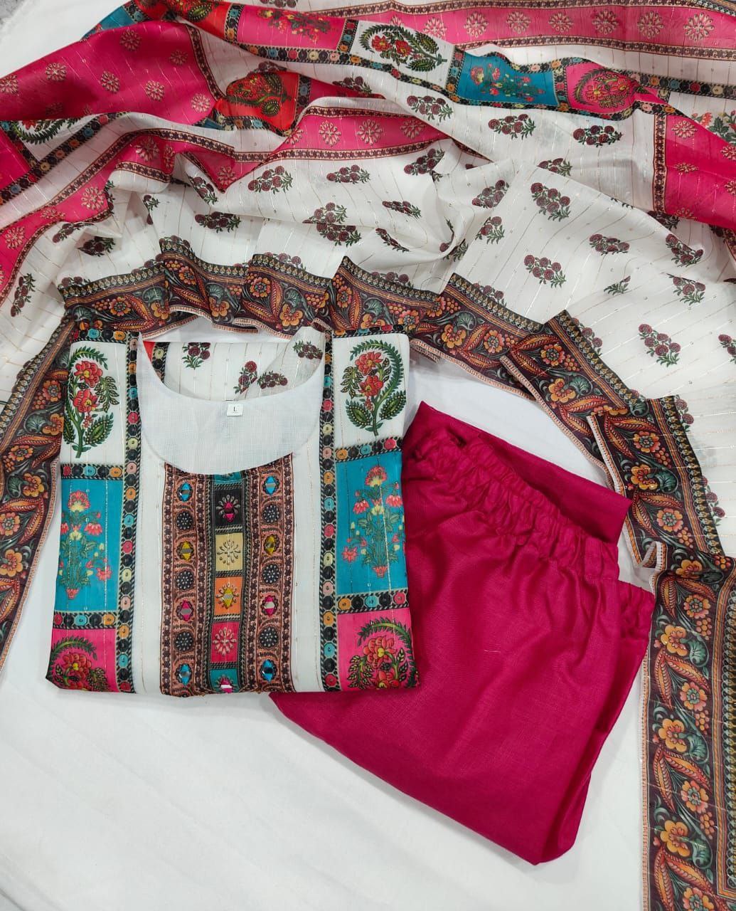 Colorful traditional fabric with intricate patterns on a white background